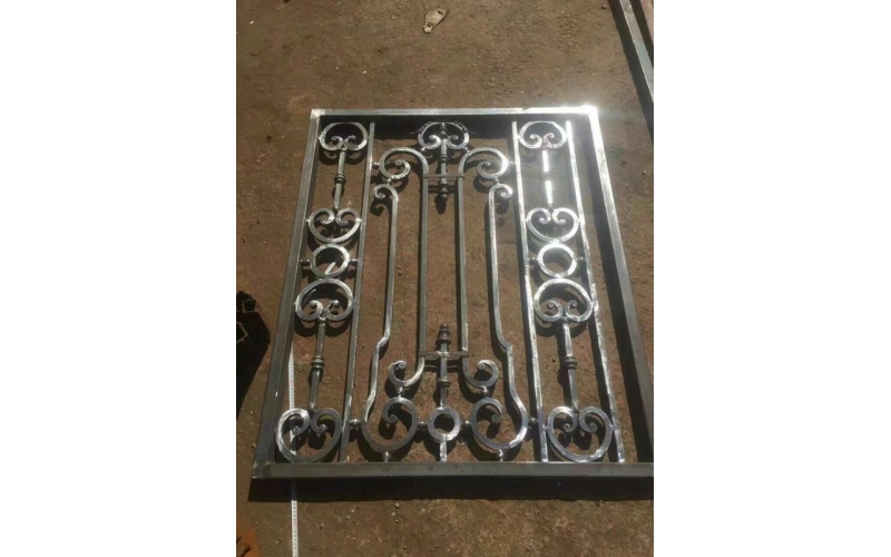 Small wrought iron courtyard gates